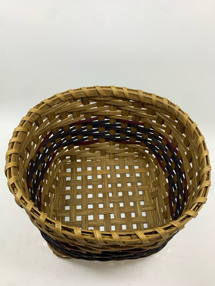 HANDMADE ROUND WOVEN SQUARE BOTTOM BASKET W/PURPLE AND BLUE LINES.