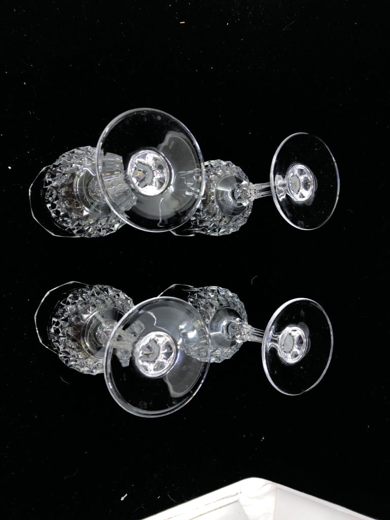 4 TALL CUT CRYSTAL WINE GLASSES.
