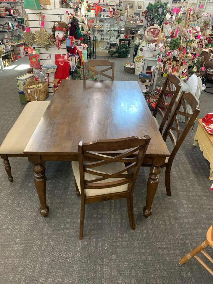 DARK WOOD TABLE W 4 CREAM CUSHIONED CHAIRS AND BENCH.