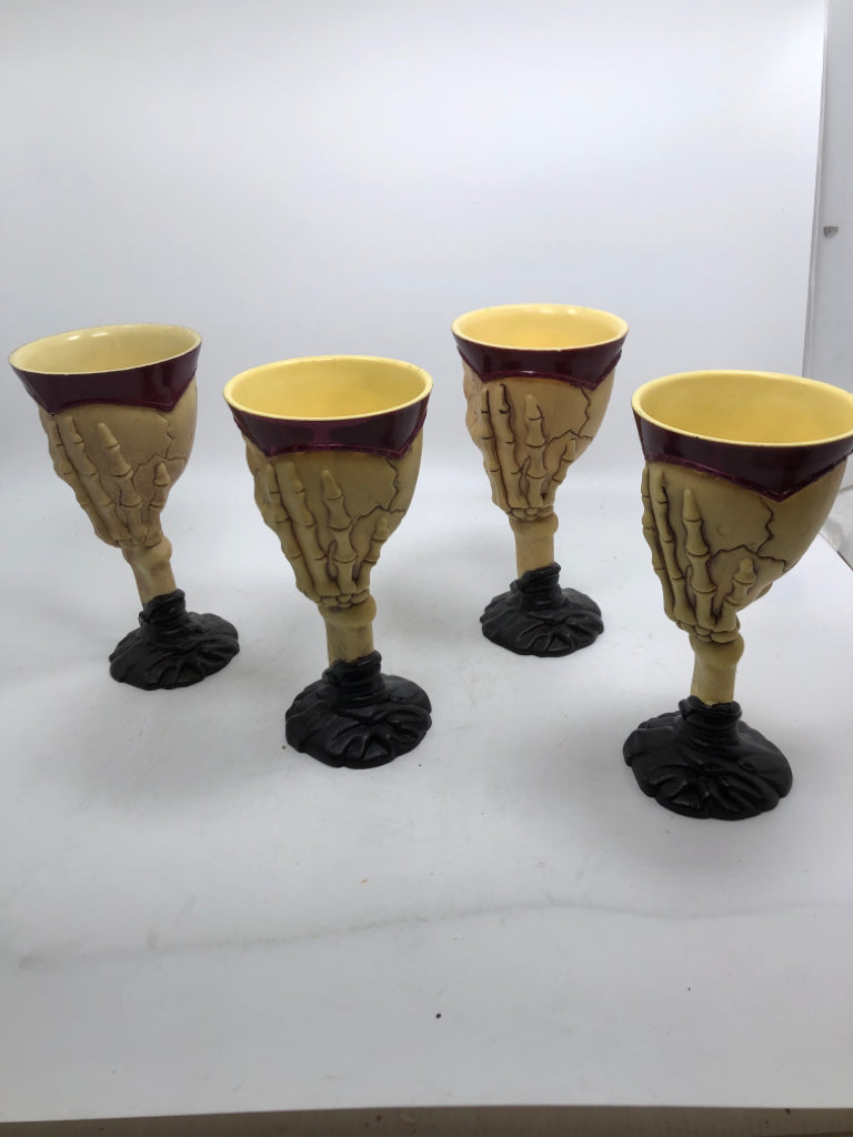 4 RED & CREAM SKULL GOBLETS.