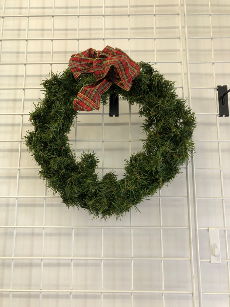 GREENS WREATH W/ PLAID BOW.
