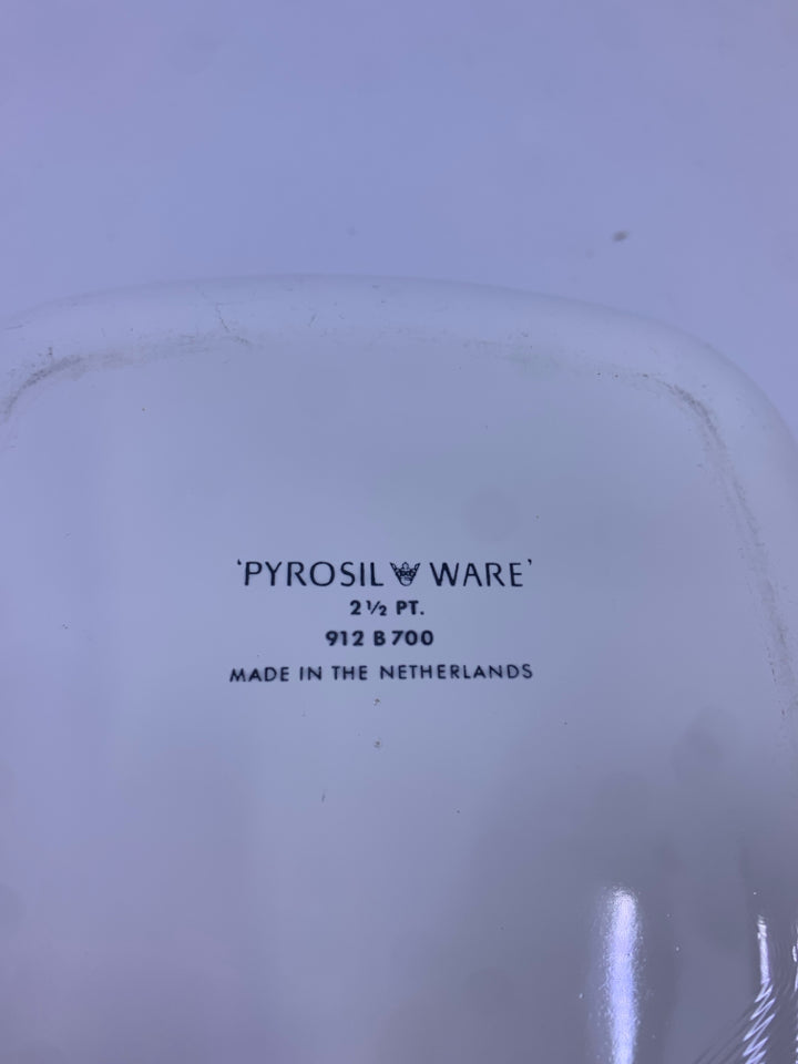 WHITE CASSEROLE DISH WITH BLUE FLORAL.