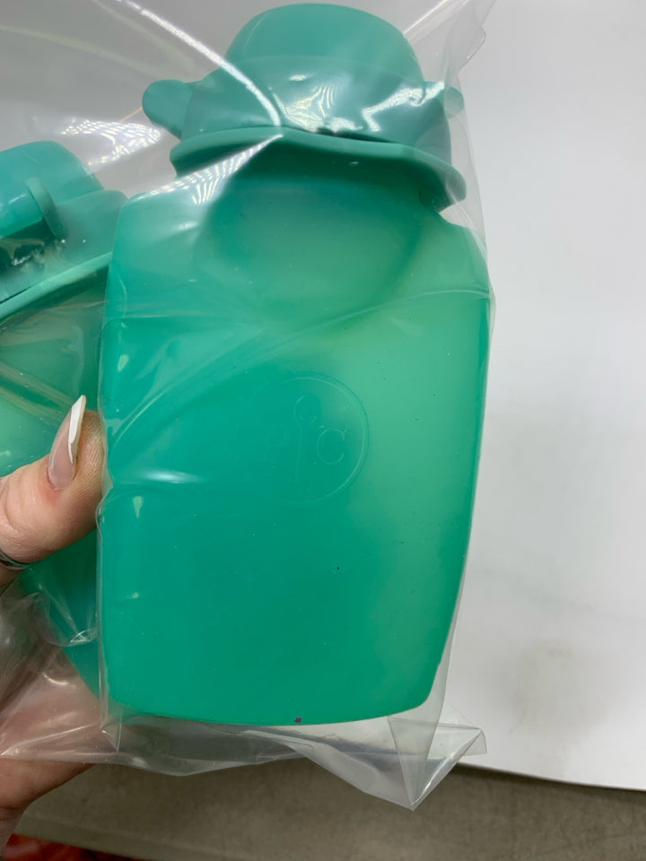 2 SILICONE CONDIMENT BOTTLES IN BAG.