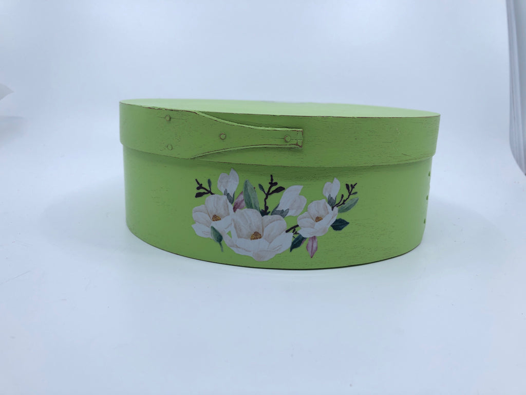 GREEN ROUND WOOD BOX W WHITE FLOWERS.