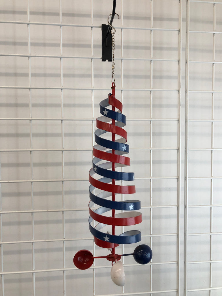 RED WHITE AND BLUE METAL WIND SPINNER.