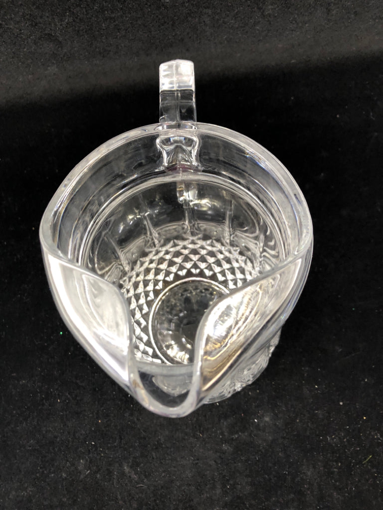 GLASS PITCHER W HANDLE.