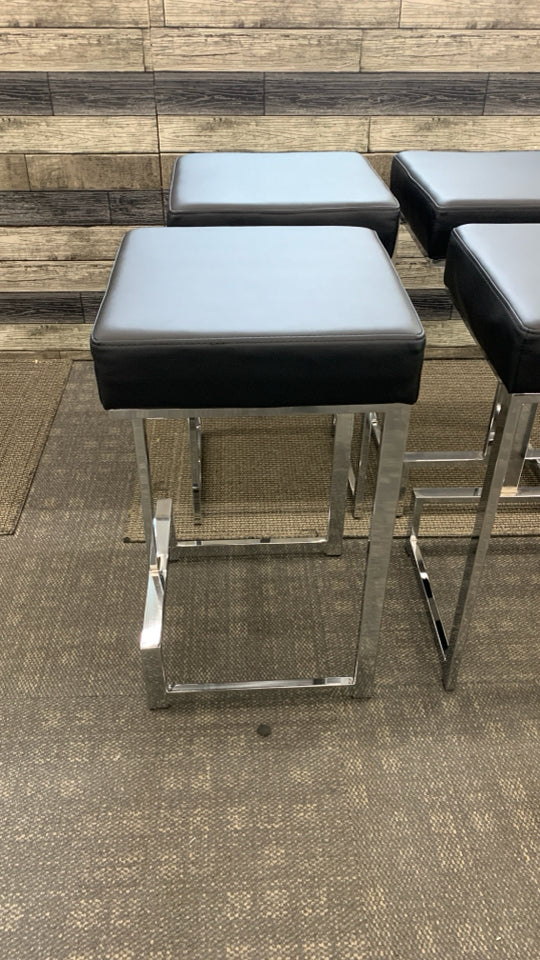 4 CHROME SQUARE STOOLS W/BLACK FAUX LEATHER SEAT.