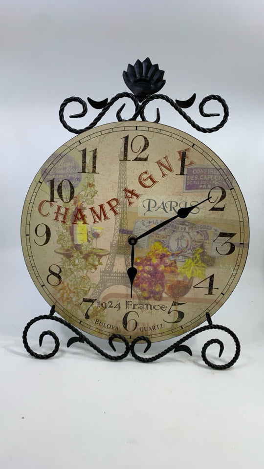 PARIS SHELF CLOCK W/BLACK SCROLL STAND.