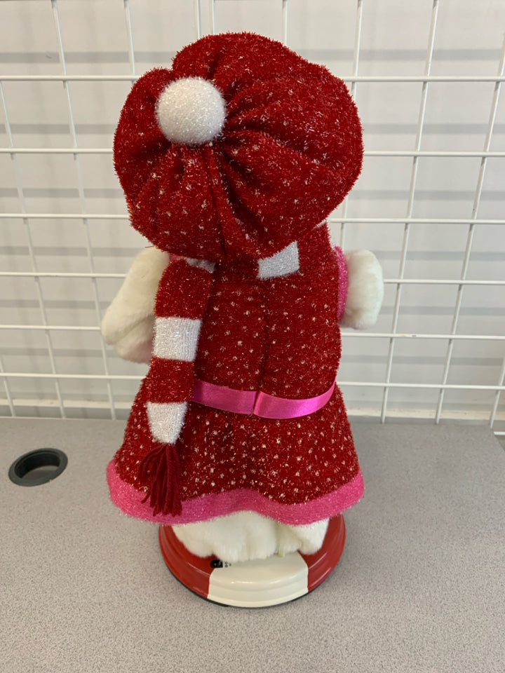 TWIRLING MUSICAL SNOWWOMAN.