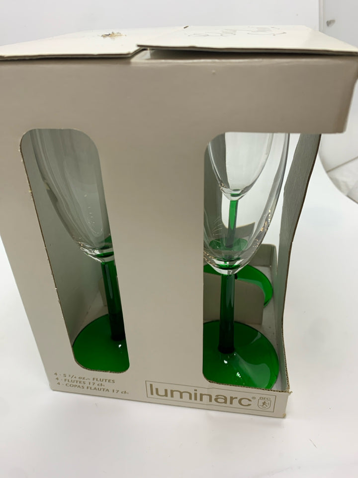 NIB LUMINARC 4PC GREEN-STEM FLUTES.