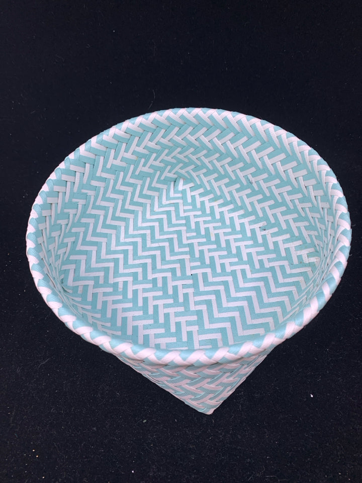 TEAL AND WHITE WOVEN BASKET.