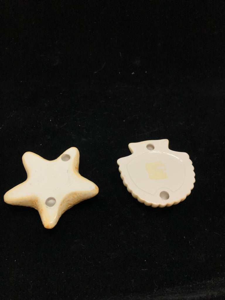 2 STARFISH/SEASHELL GLAZED CANDLE HOLDERS.