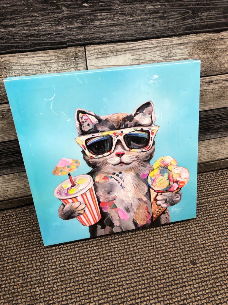 CAT HOLDING ICE CREAM CANVAS WALL ART.