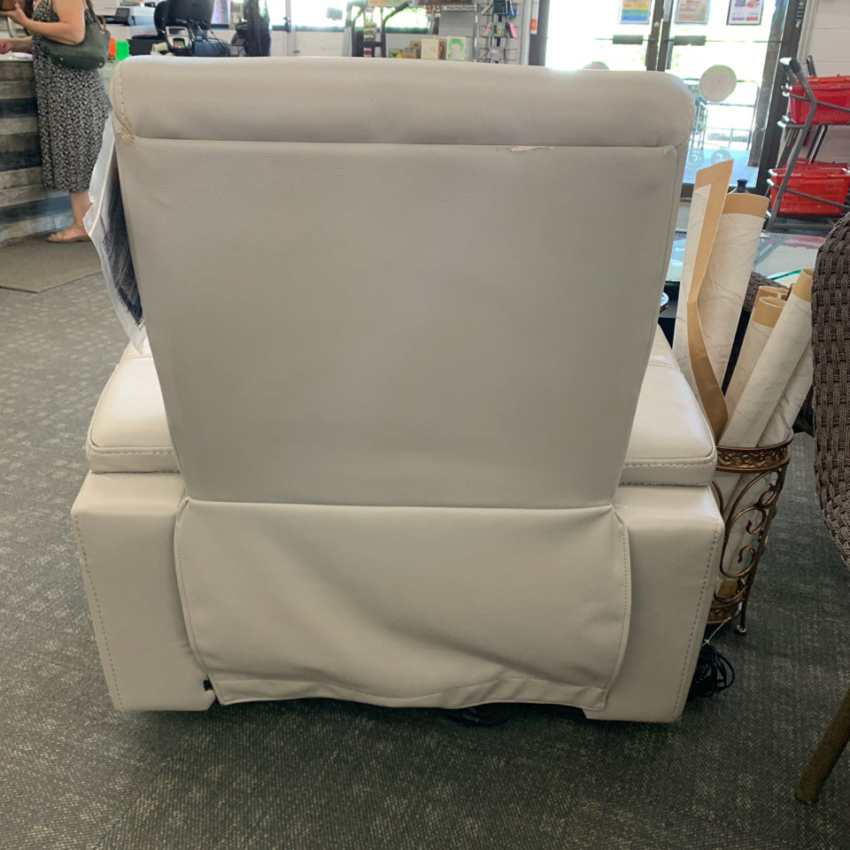ASHLEY FURNITURE CREAM LEATHER RECLINING LOUNGE CHAIR W/TAGS.