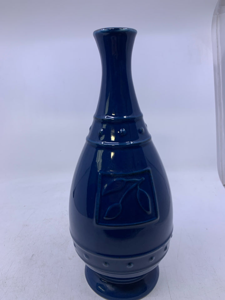 FOOTED DARK BLUE W/ EMBOSSED LEAVES.