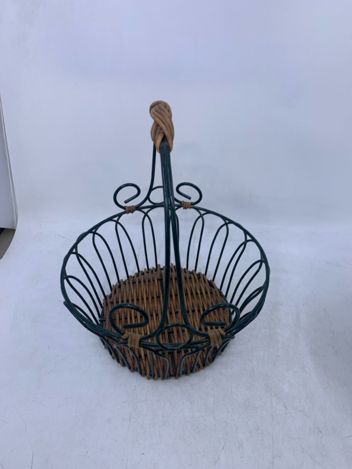 SMALL GREEN METAL BASKET W/ WOVEN BOTTOM.
