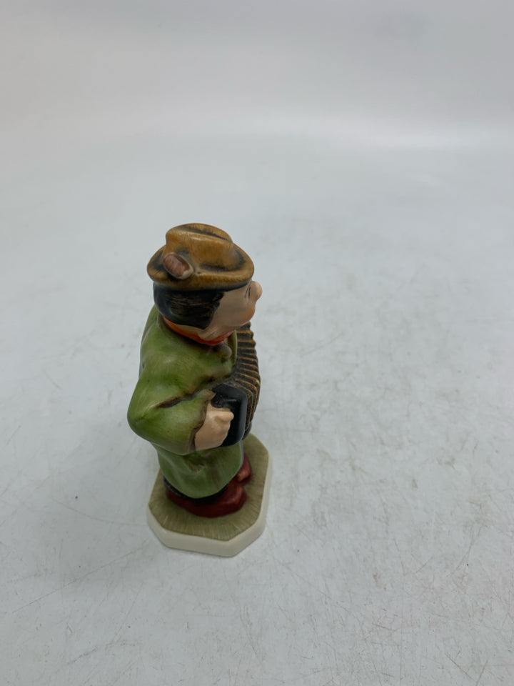 VTG FRIEDEL GERMAN GREEN COAT MAN PLAYING ACCORDION FIGURINE.