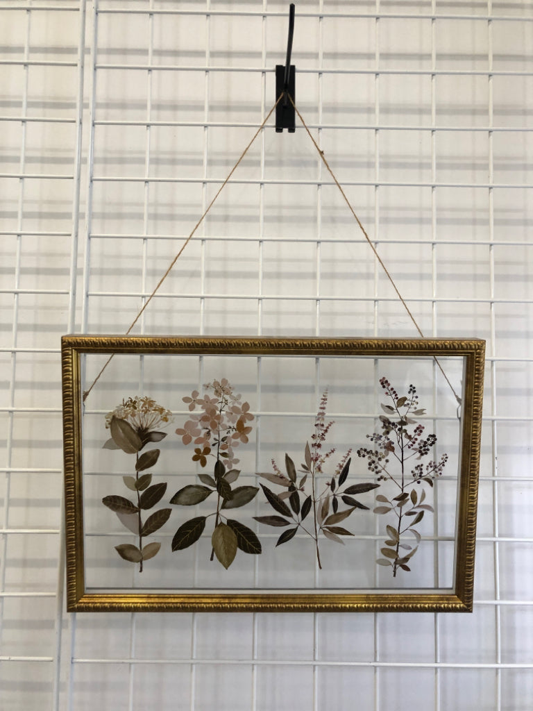 FLOWER PHOTO IN GLASS W/GOLD FRAME.