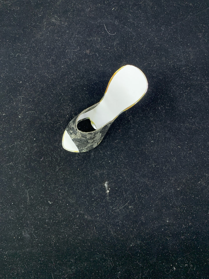 SILVER SHOE BOTTLE OPENER.