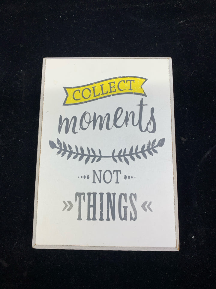 COLLECT MOMENTS WHITE SIGN.