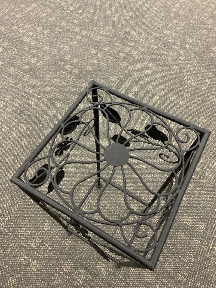 BLACK METAL PLANT STAND W/FLORAL DECOR.