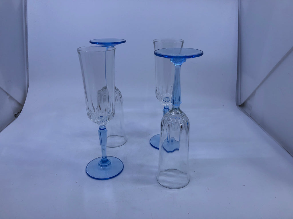 5 BLUE STEM CUT GLASS CHAMPAGNE FLUTES.