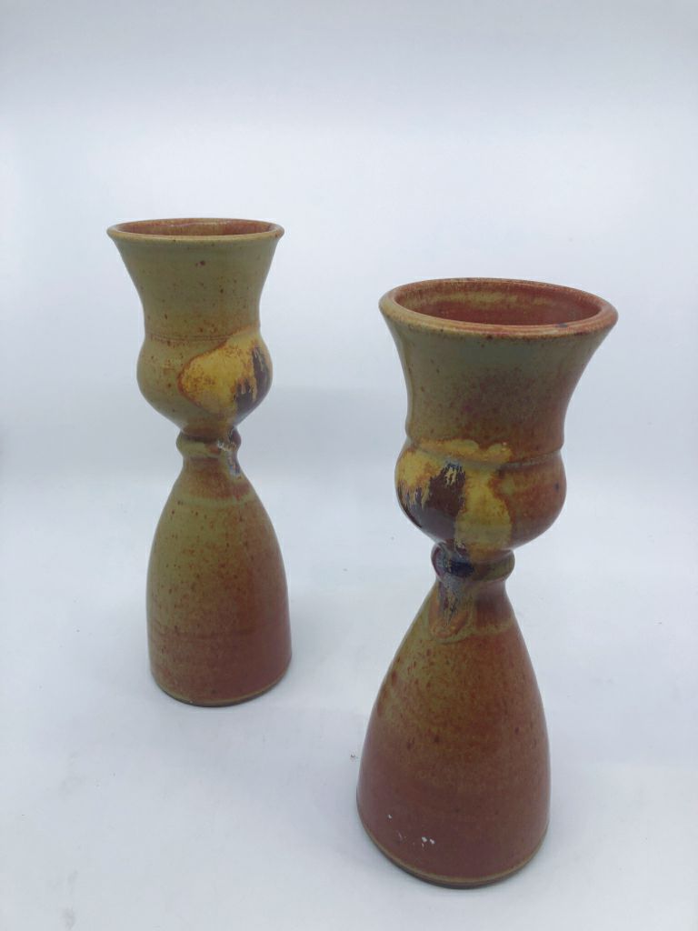 2 POTTERY CANDLE HOLDERS- SIGNED.