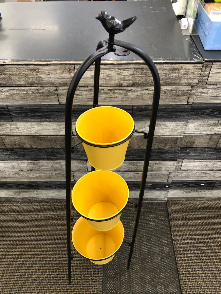 BLACK 3 LEG PLANT STAND W/3 YELLOW POTS.