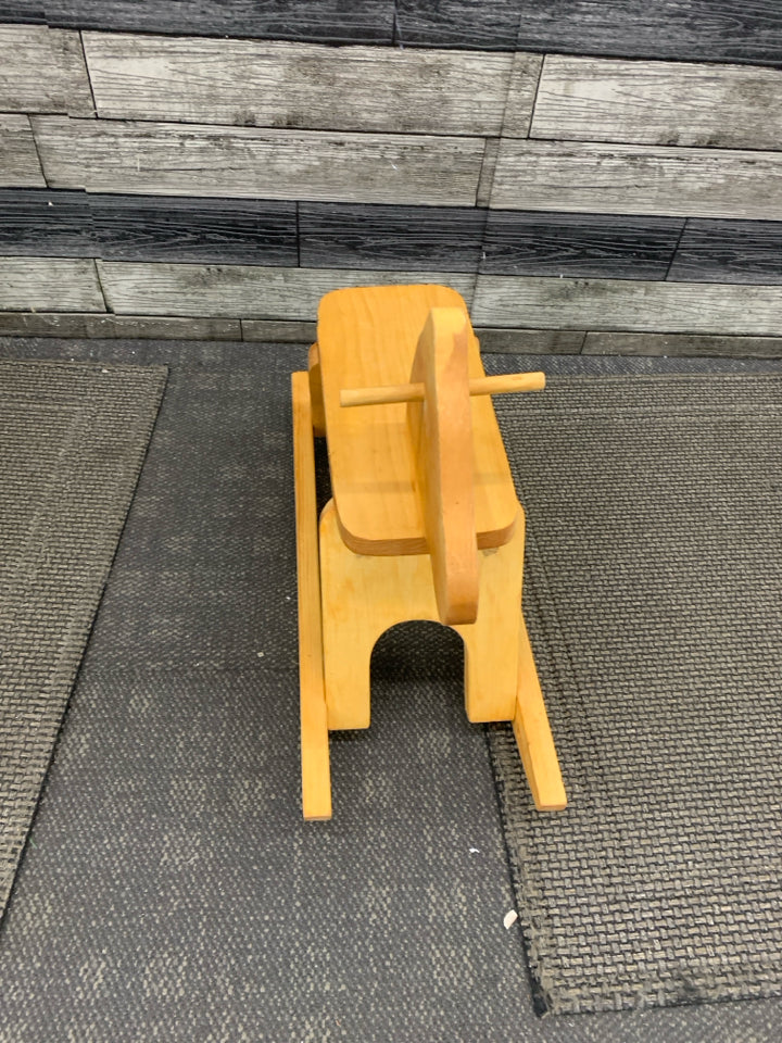 TAN WOODEN DECOR ROCKING HORSE.