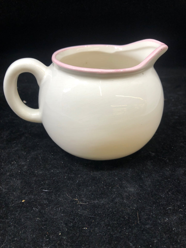 WOMANS FACE SMALL PITCHER.