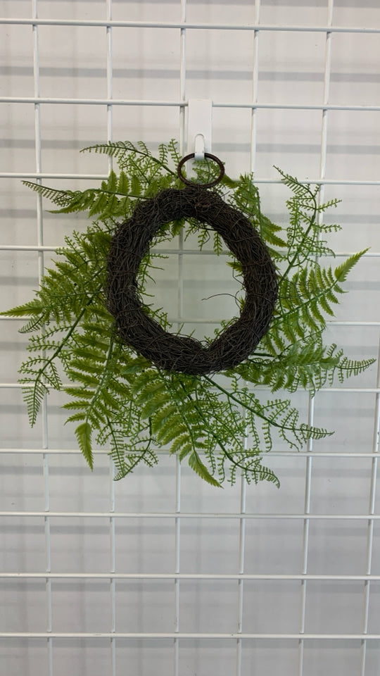FAUX FERN WREATH W/TWIG DESIGN.
