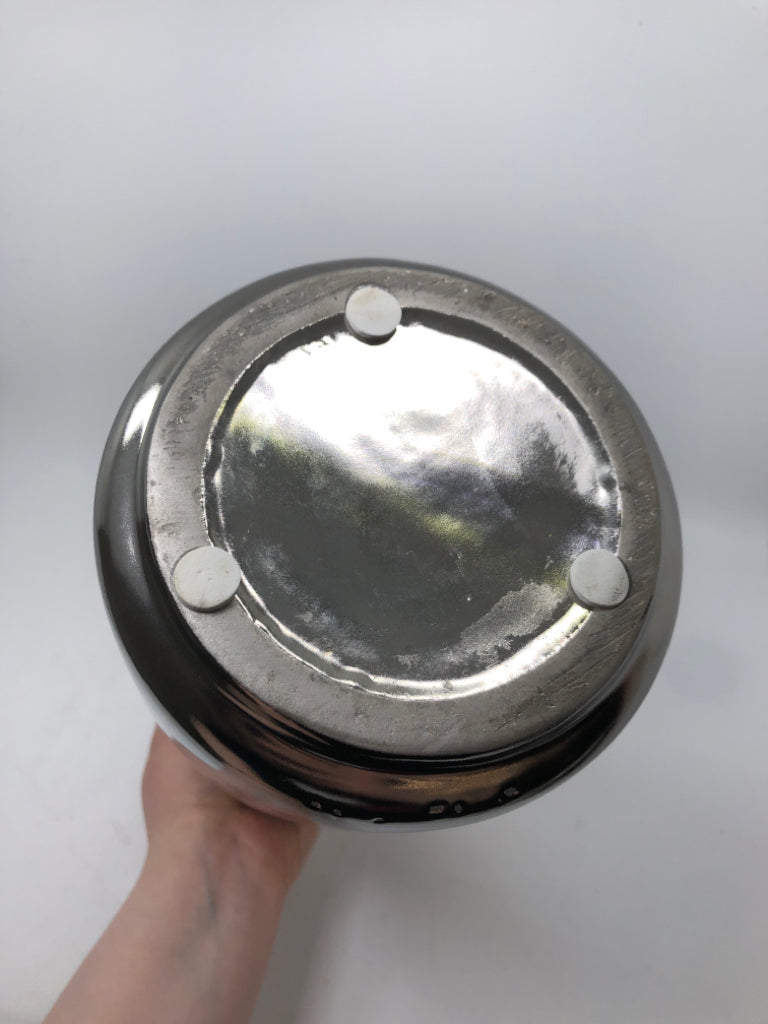 SILVER FACE VASE.