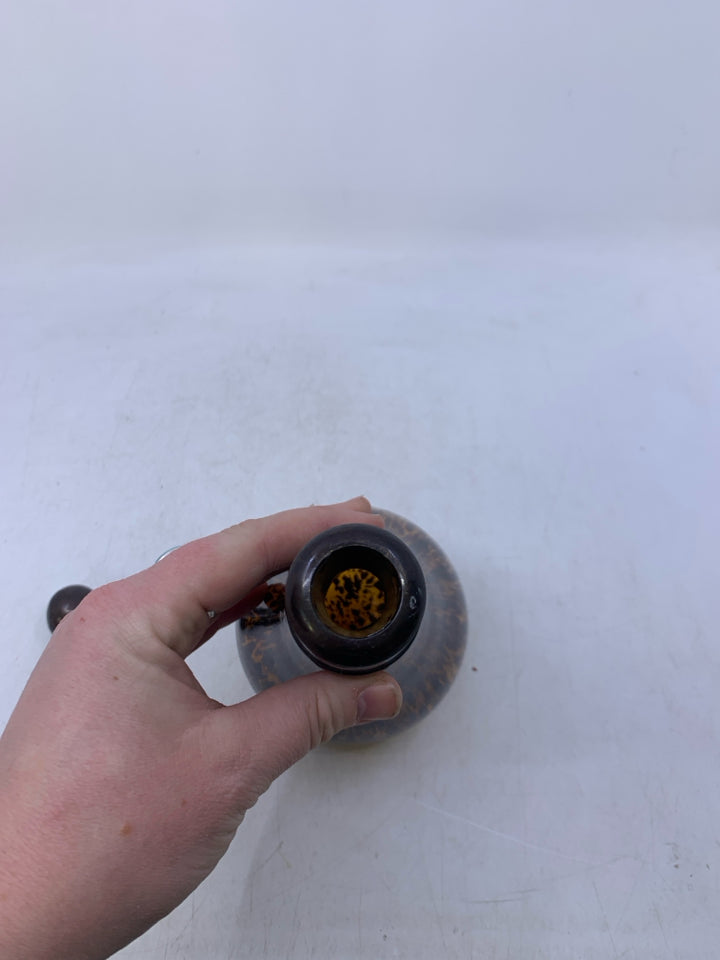 AMBER GLASS W/ LARGE BROWN SPOTS DECANTER W/ METAL STOPPER.