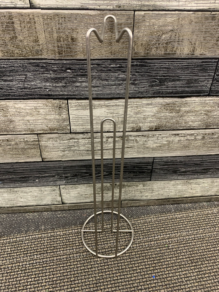 SILVER TOILET PAPER HOLDER.