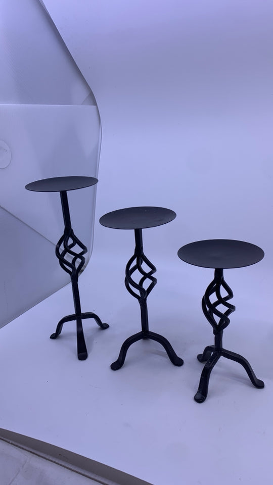 3 METAL SCROLL PILLAR CANDLE HOLDERS.