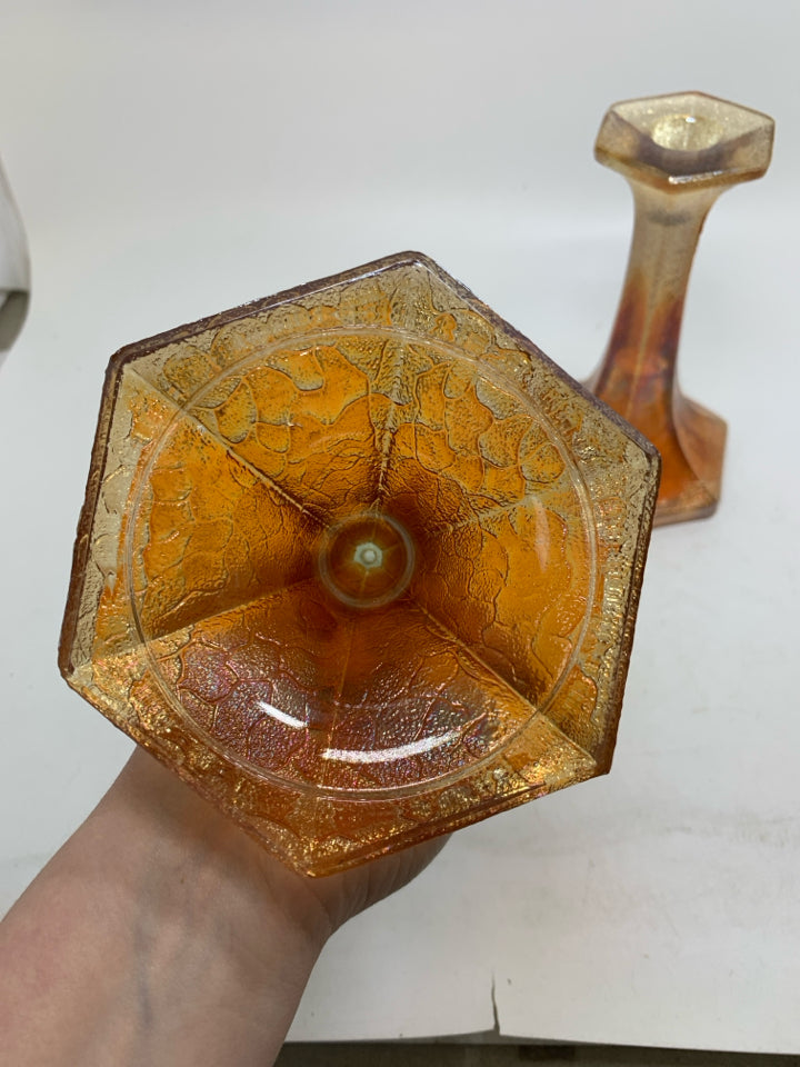 2 FOOTED MARIGOLD TEXTURED GLASS TAPERED CANDLE HOLDERS.
