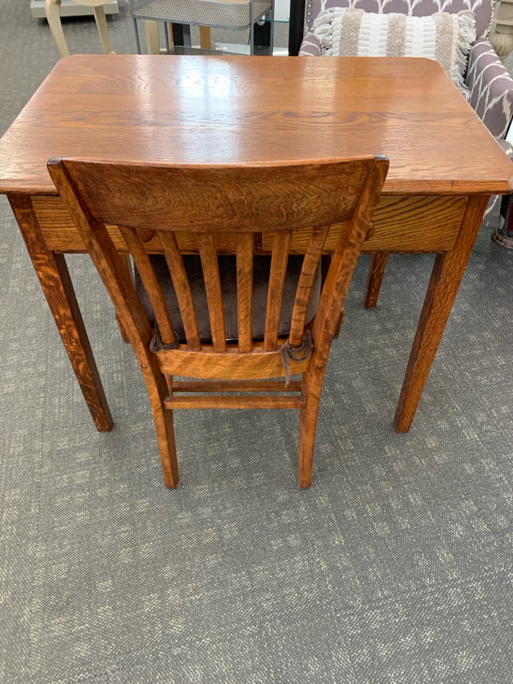 HEAVY WOOD DESK W/2 DRAWERS & CHAIR W/BROWN CUSHION.