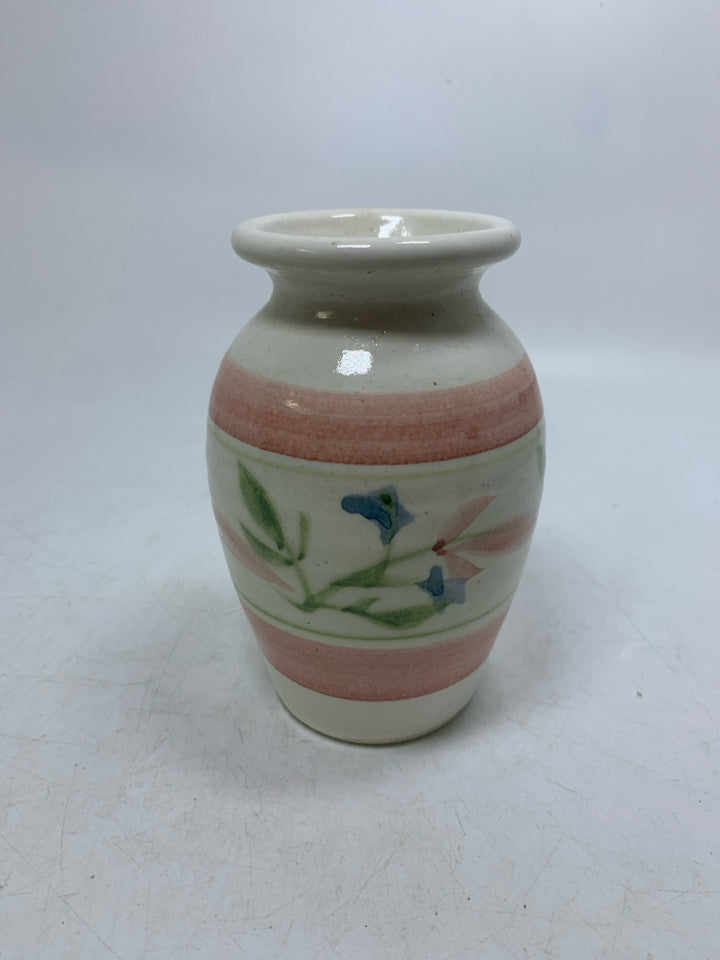 WHITE VASE W/ PALE PINK BANDS/ BLUE FLOWERS.