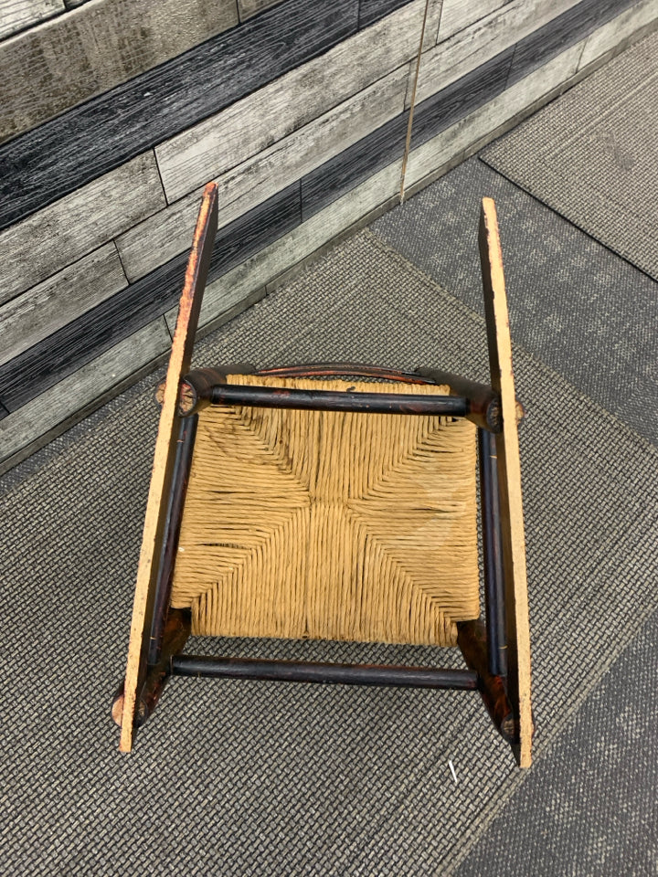 VTG SMALL CHILDS ROCKING CHAIR W WICKER BOTTOM.