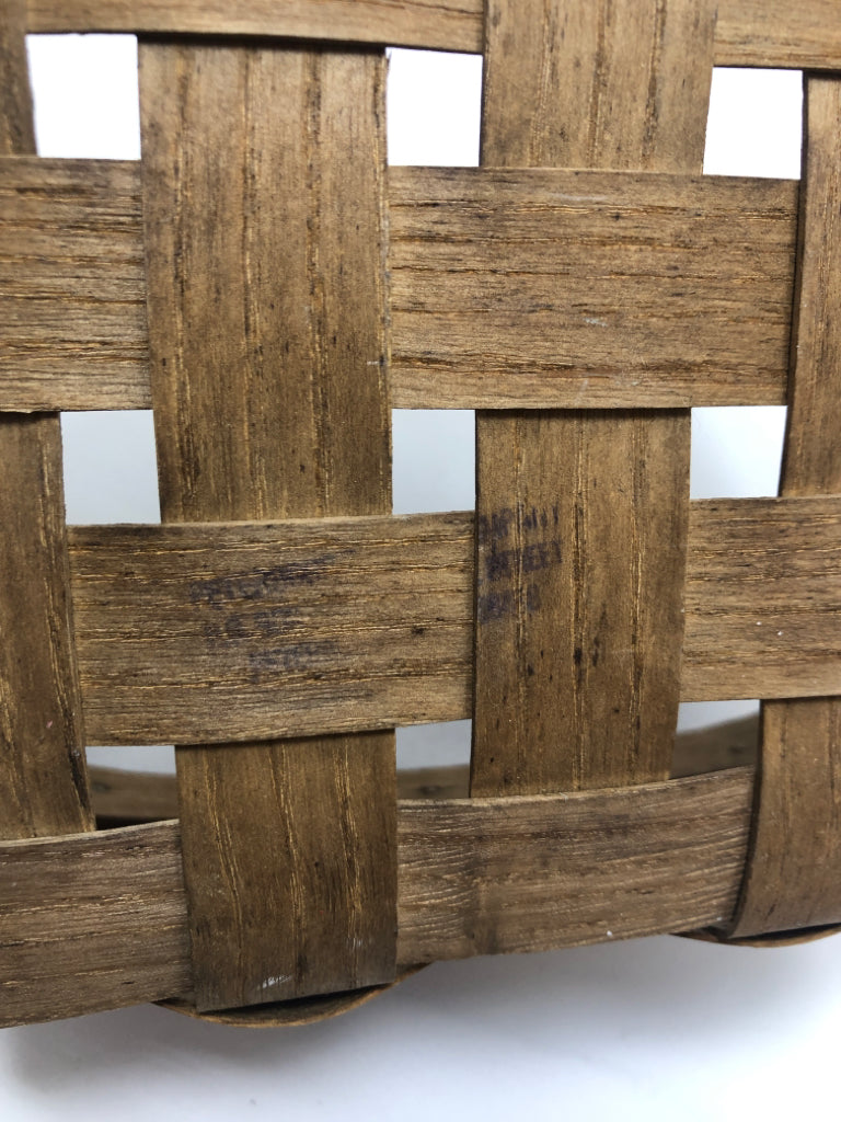LIGHT BROWN WOVEN BASKET.