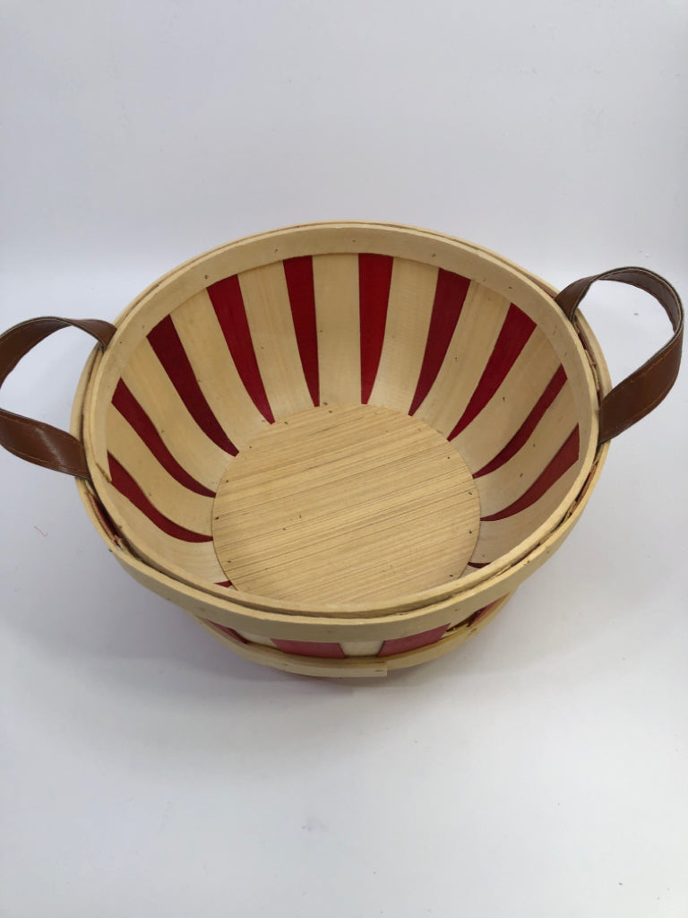 ROUND BASKET W/RED AND FAUX LEATHER HANDLES.
