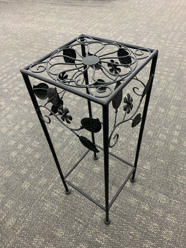 BLACK METAL PLANT STAND W/FLORAL DECOR.