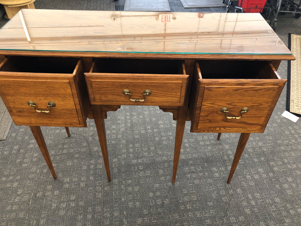 TALL WOOD BUFFET 3 DRAWER TABLE W/ GLASS TOP.