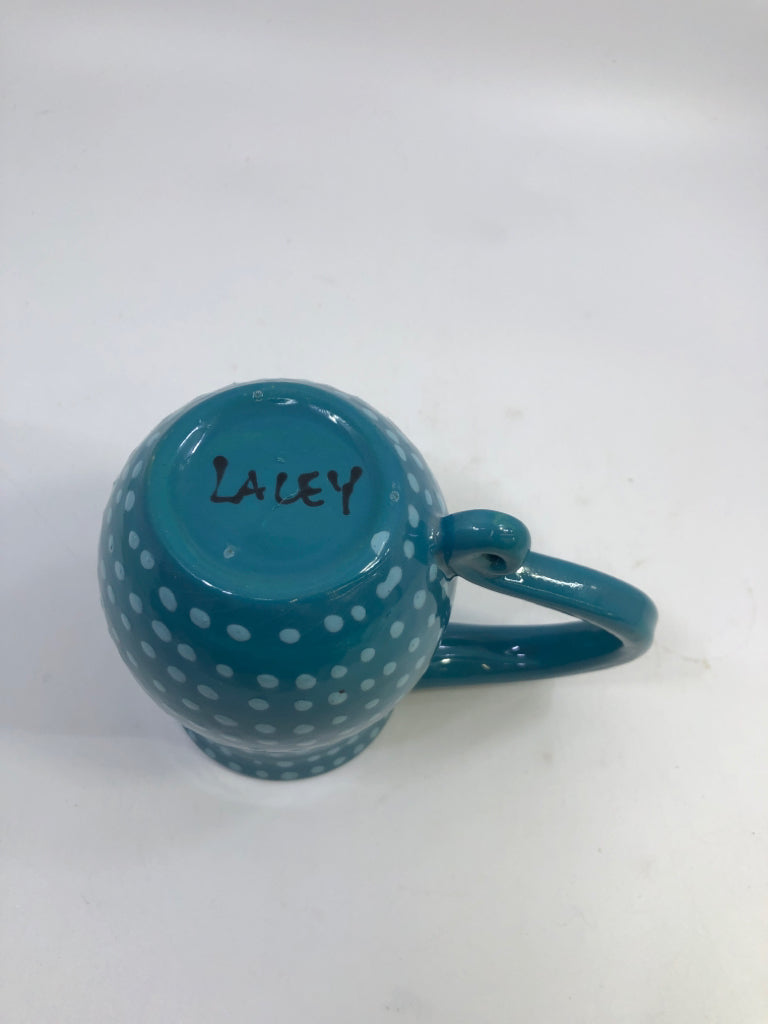 BLUE DOTTED MUG W/CURVED HANDLE.
