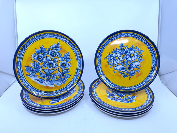 8 BLUE AND YELLOW FLORAL MELAMINE LUNCH PLATES.