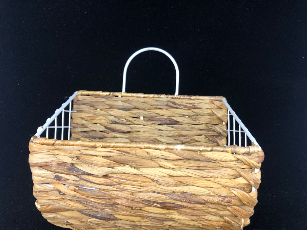 WICKER AND WHITE METAL WALL HANGING BASKET.