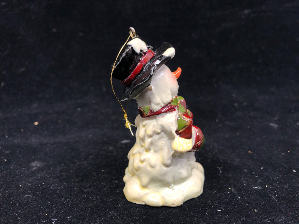 SNOWMAN HOLDING BROOM ORNAMENT.