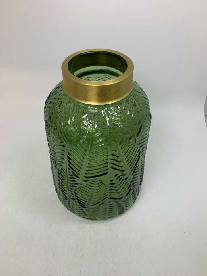 TEXTURED DARK GREEN VASE W/ GOLD METAL TOP.