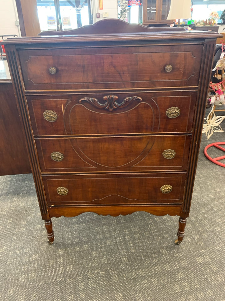 VTG TALL DRESSER W 4 DRAWERS ON WHEELS.