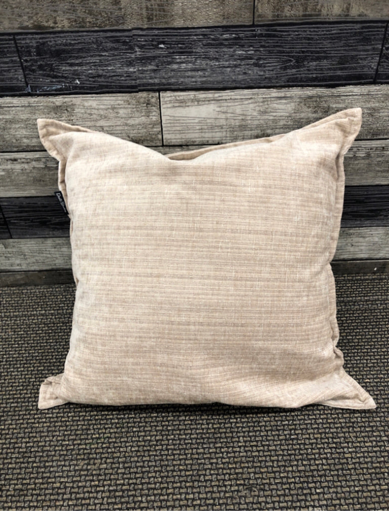 TAN AND CREAM PILLOW.